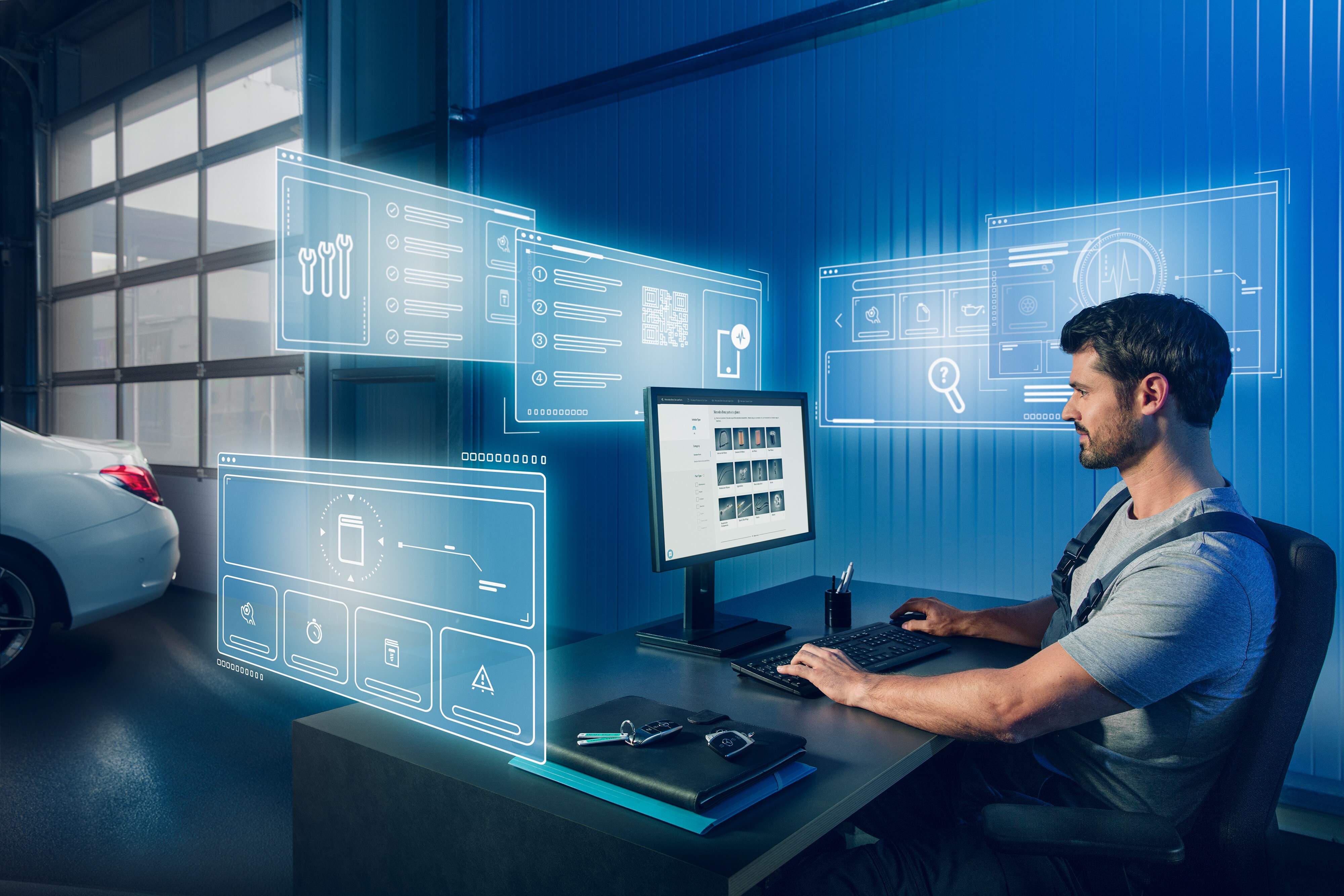 Mercedes-Benz | Pièces d'origine de qualité pour les utilitaires légers Le mécanicien recherche les pièces d'origine Mercedes-Benz appropriées dans le catalogue de pièces détachées Mercedes sur l'ordinateur.